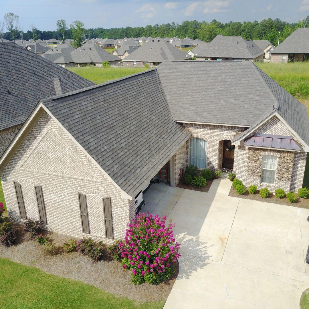 House with brown shingle roof