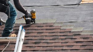 person roofing