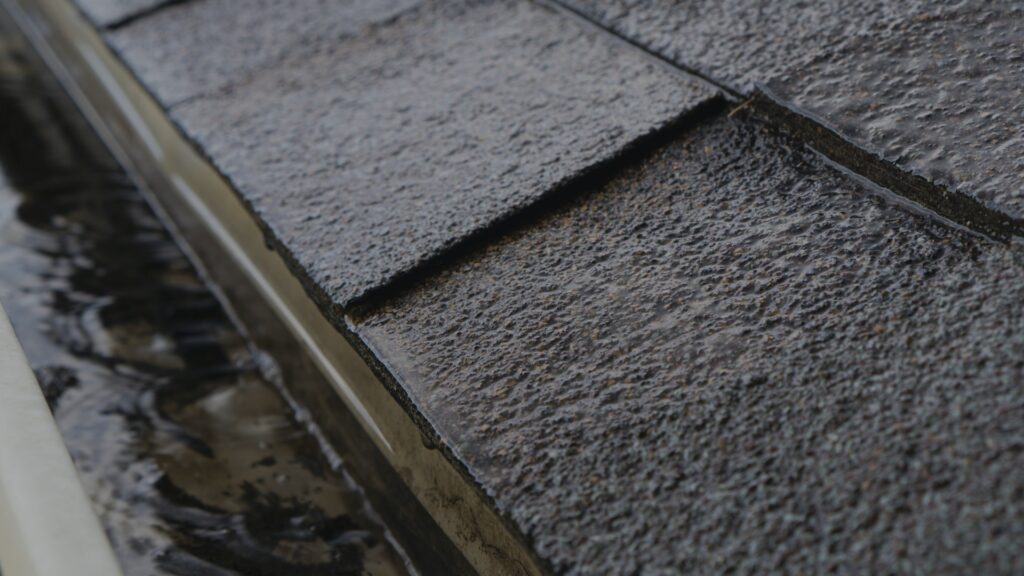 rain falling in gutter