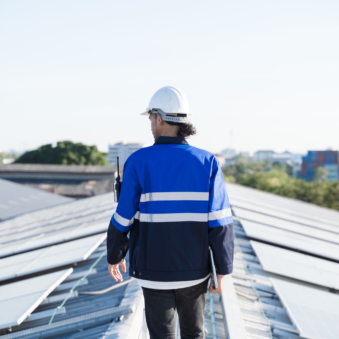 A contractor doing a commercial building roof inspection